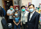 许荣茂陪同香港特别行政区行政长官探访少数族裔 同心抗疫